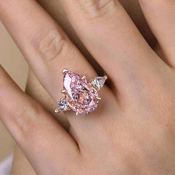 Noble Pear Cut Pink Sapphire Three Stone Engagement Ring in Sterling Silver