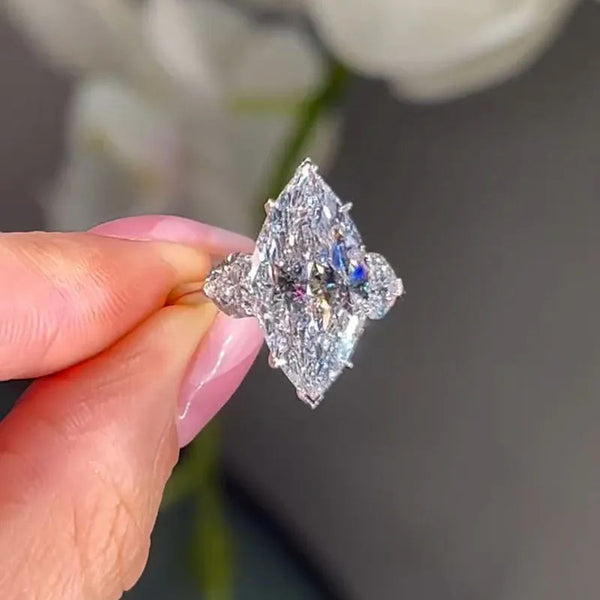 Stylish Marquise Cut Three Stone Engagement Ring in Sterling Silver