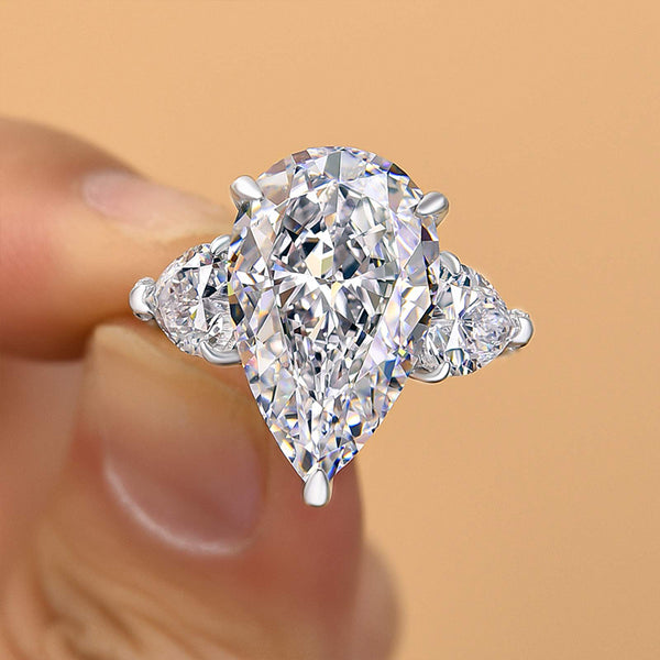 Luxurious 8 Carat Pear Cut Three Stone Women's Engagement Ring