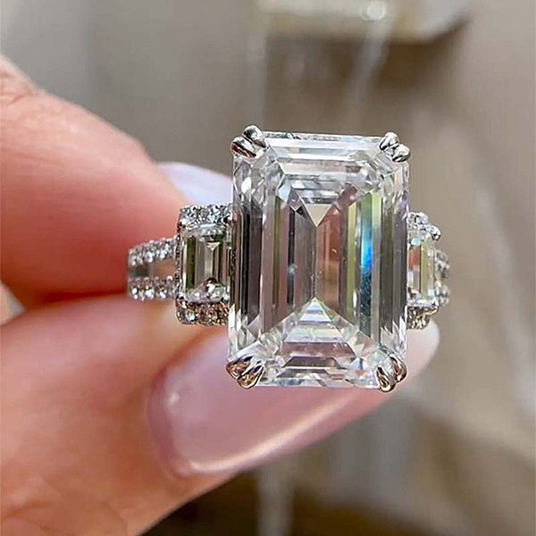 Noble Split Shank 5 Carat Emerald Cut Three Stone Engagement Ring