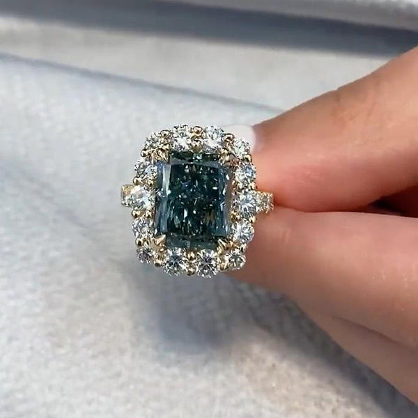 Noble Yellow Gold Radiant Cut Montana Blue Sapphire Halo Engagement Ring