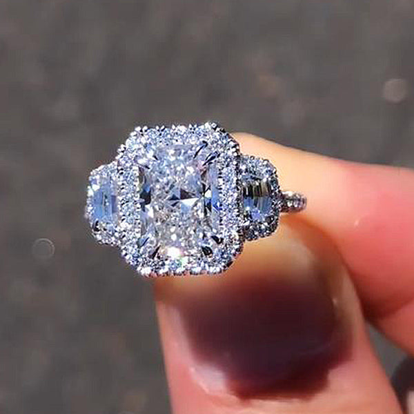 Gorgeous Radiant Cut Three Stone Halo Engagement Ring in Sterling Silver