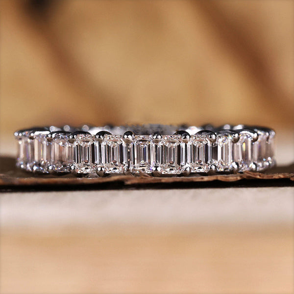 4 Prong Set Elegant Emerald Cut Wedding Band in Sterling Silver